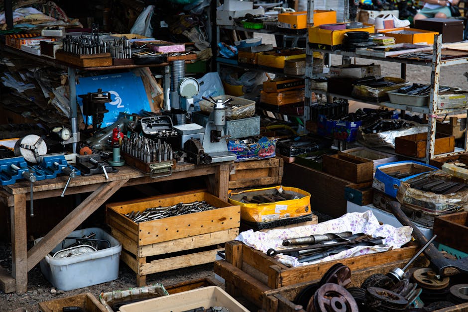 A detailed view of a workshop showcasing a variety of tools and equipment for crafting and repairs.